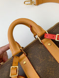 LV Keepall Bandouli ère 25 handbag