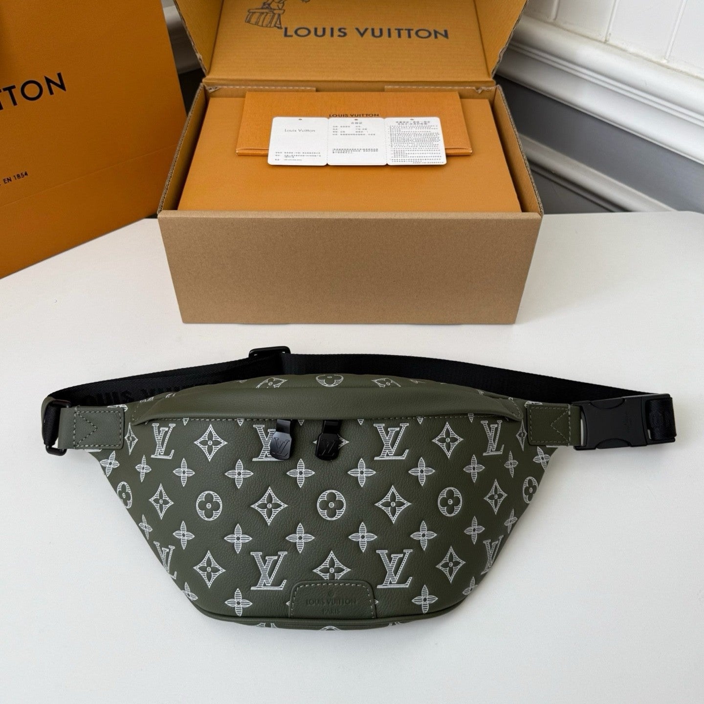 LV DISCOVERY FULL LEATHER CHEST BAG