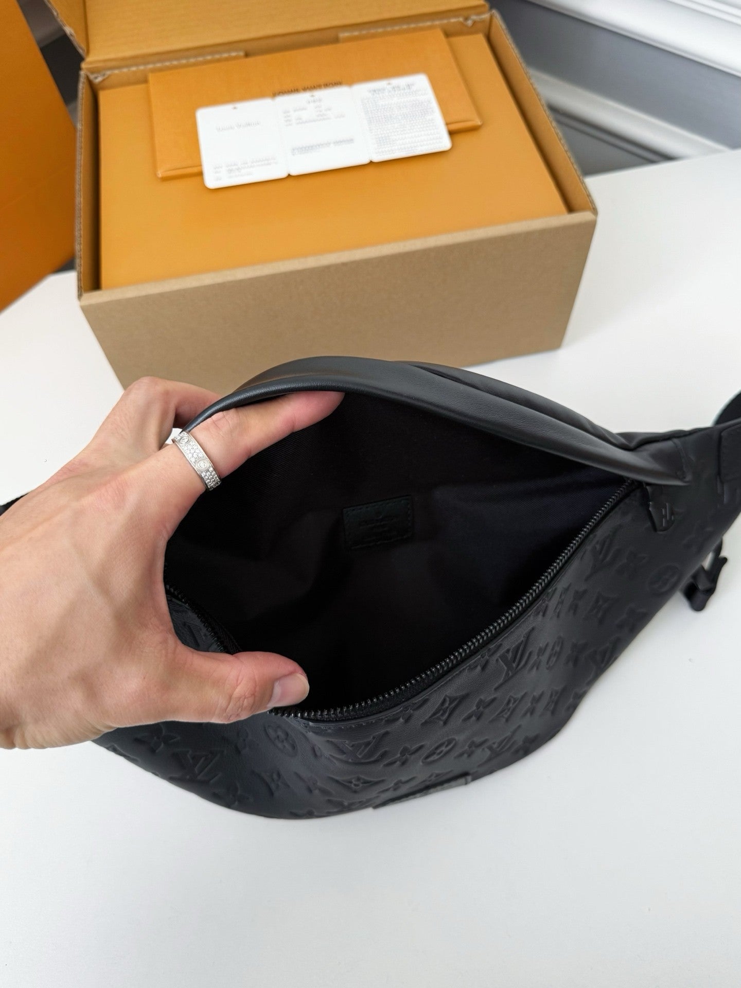 LV DISCOVERY FULL LEATHER CHEST BAG M44